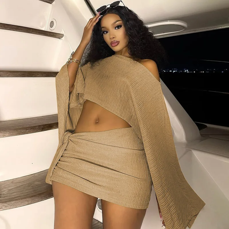 2026 Spring and Summer New Vacation Wind Breathable Diagonal Collar Off-the-shoulder Top Strap Hip Skirt Set