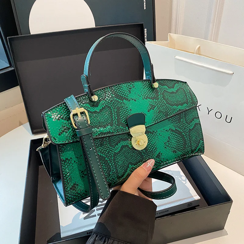 

Fashion Handbag 2025 Wwomen's New Crossbody Leather Purse Serpentine Pattern Designer Bucket Luxury Brand Solid Color Tote Bag