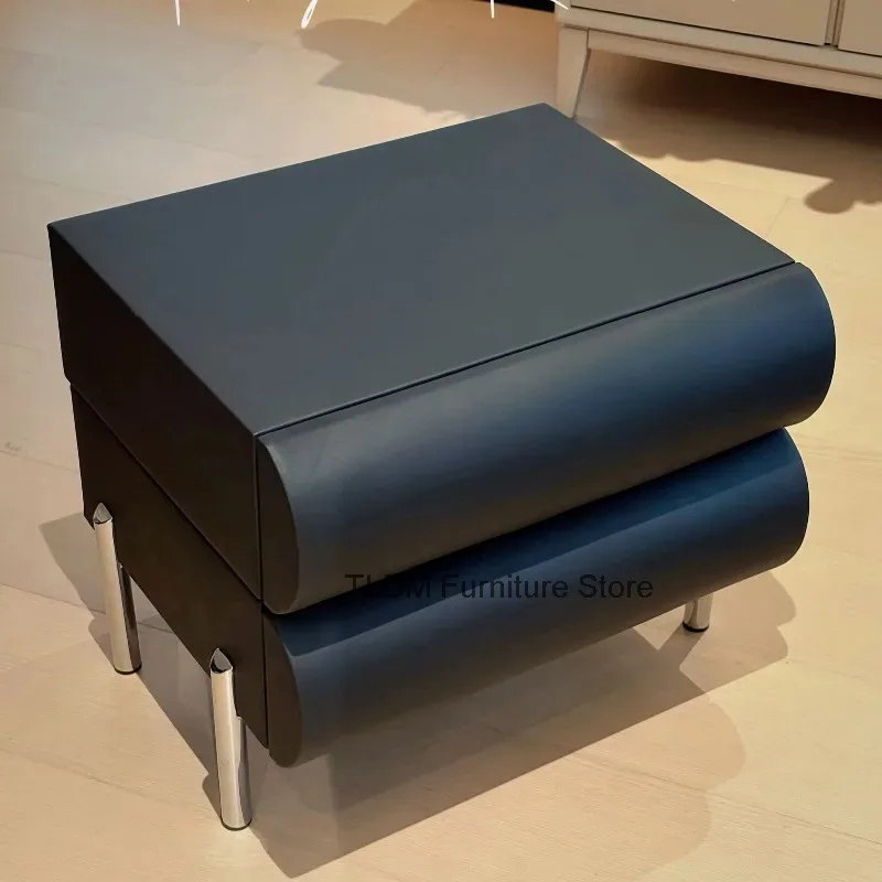 Layered Curved Leather Side Table Polished Metal Support Legs Creative Stacked Design Small Bedroom Storage Cabinet