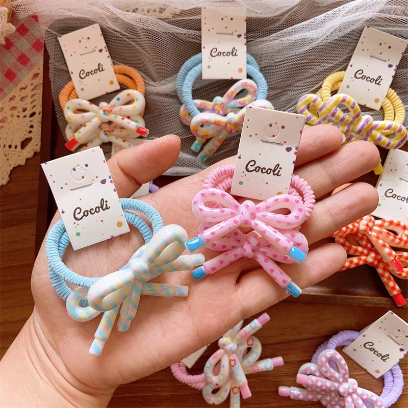 

Новые корейские детские резинки для волос с кремовыми конфетными цветами, бантиками из смолы, милые и сладкие резинки-бантики для девочек, детские аксессуары для волос