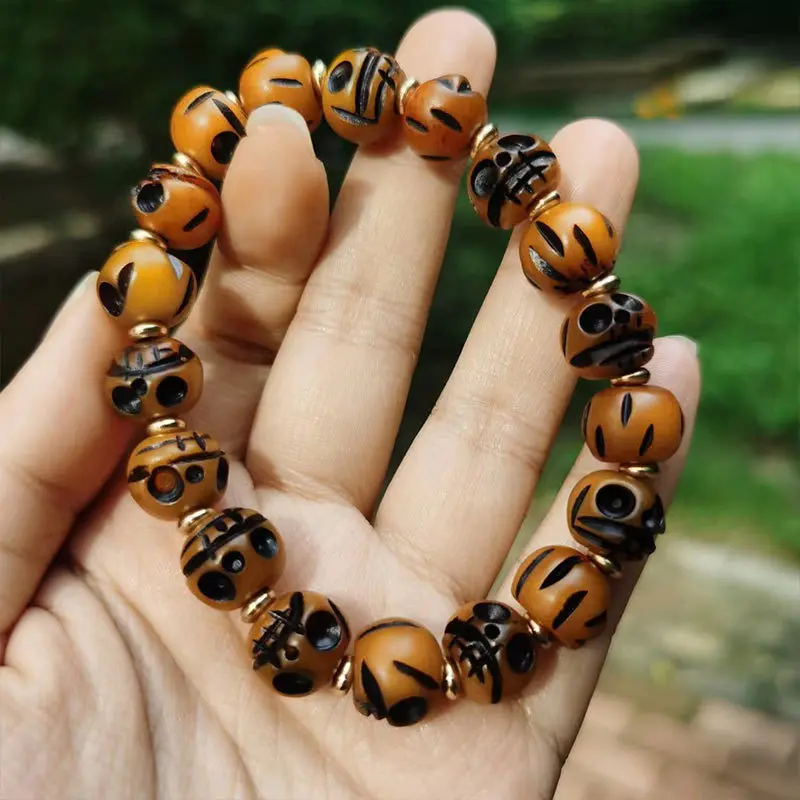 Northern camel bone skull beads 12mm 18 pieces ethnic style carving suitable for Tibetan Buddhist practitioners