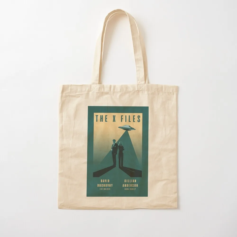 

The X Files Mulder and Scully David Duchovny and Gillian Anderson Retro Vintage Poster Tote Bag