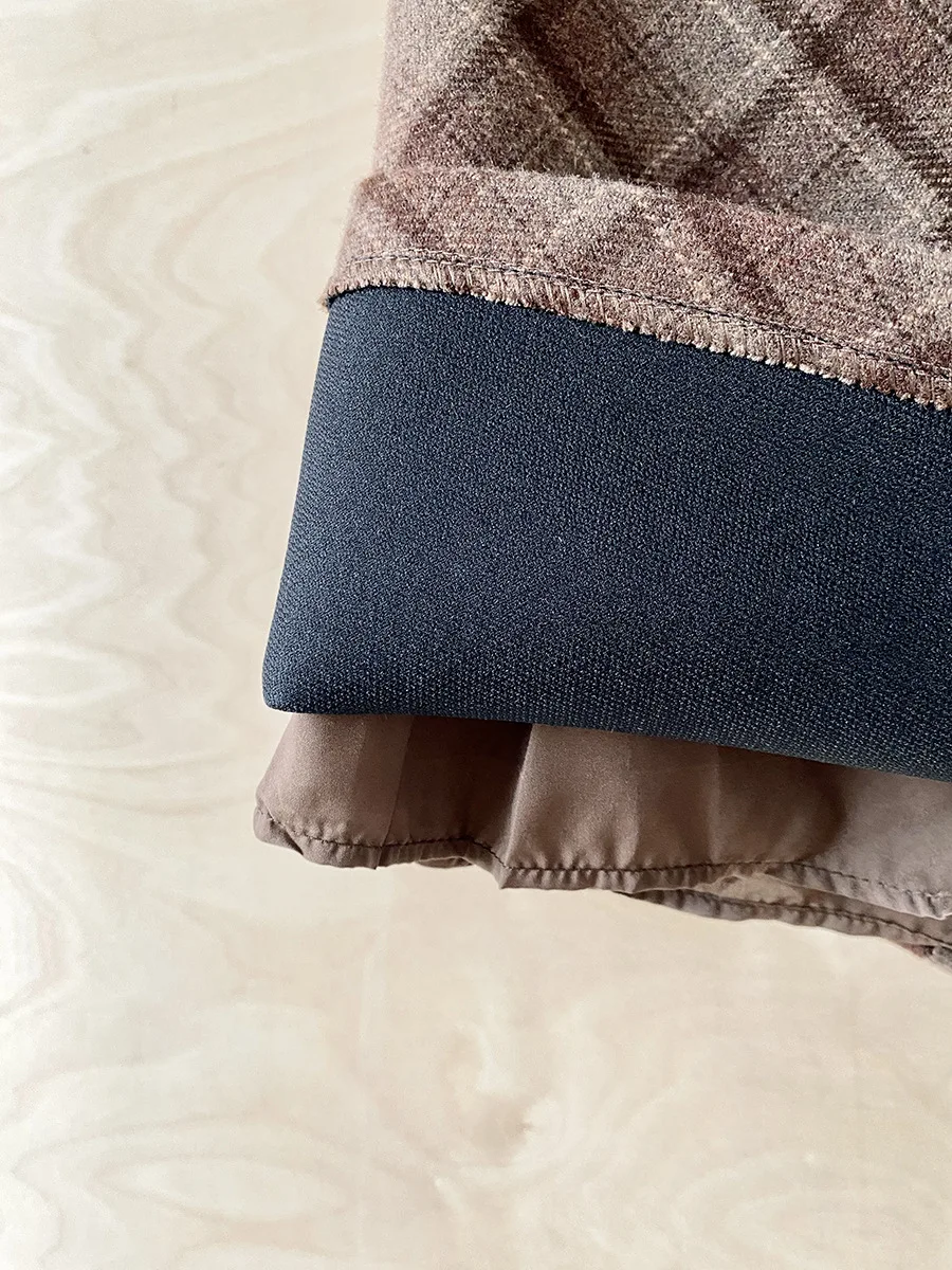 2025 autumn new versatile high waist slimming woolen skirt for women's autumn and winter fashion A-line hip hugging short skirt