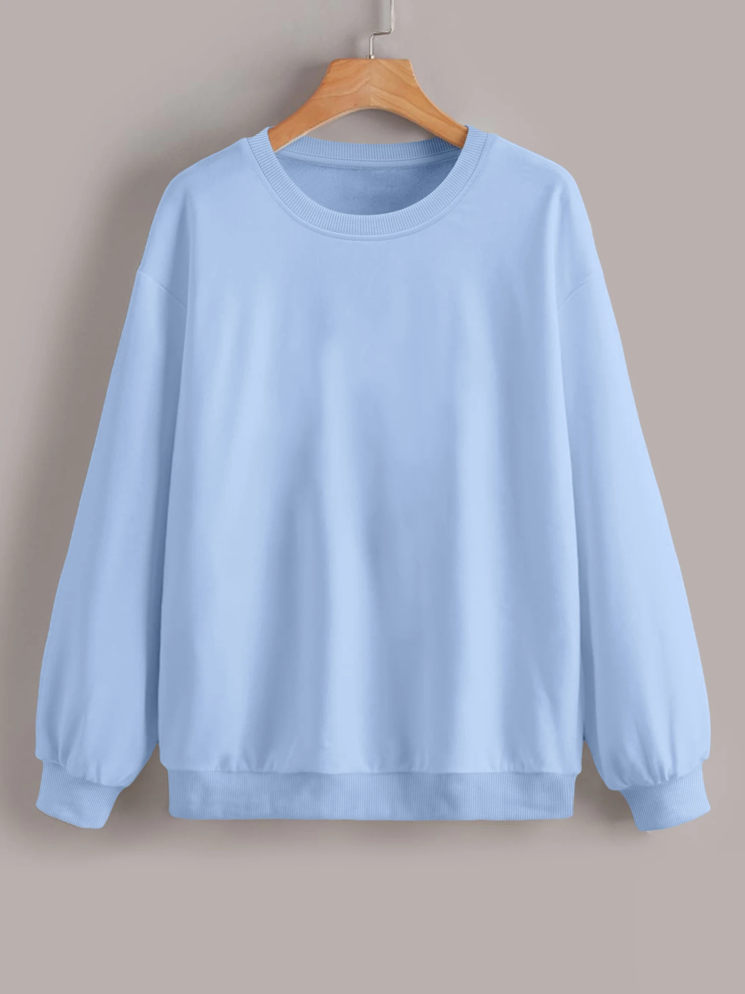 Bonbonfarbener, einfarbiger Langarmpullover aus weichem und hautfreundlichem Stoff, ein modisches Must-Have für alle Jahreszeiten