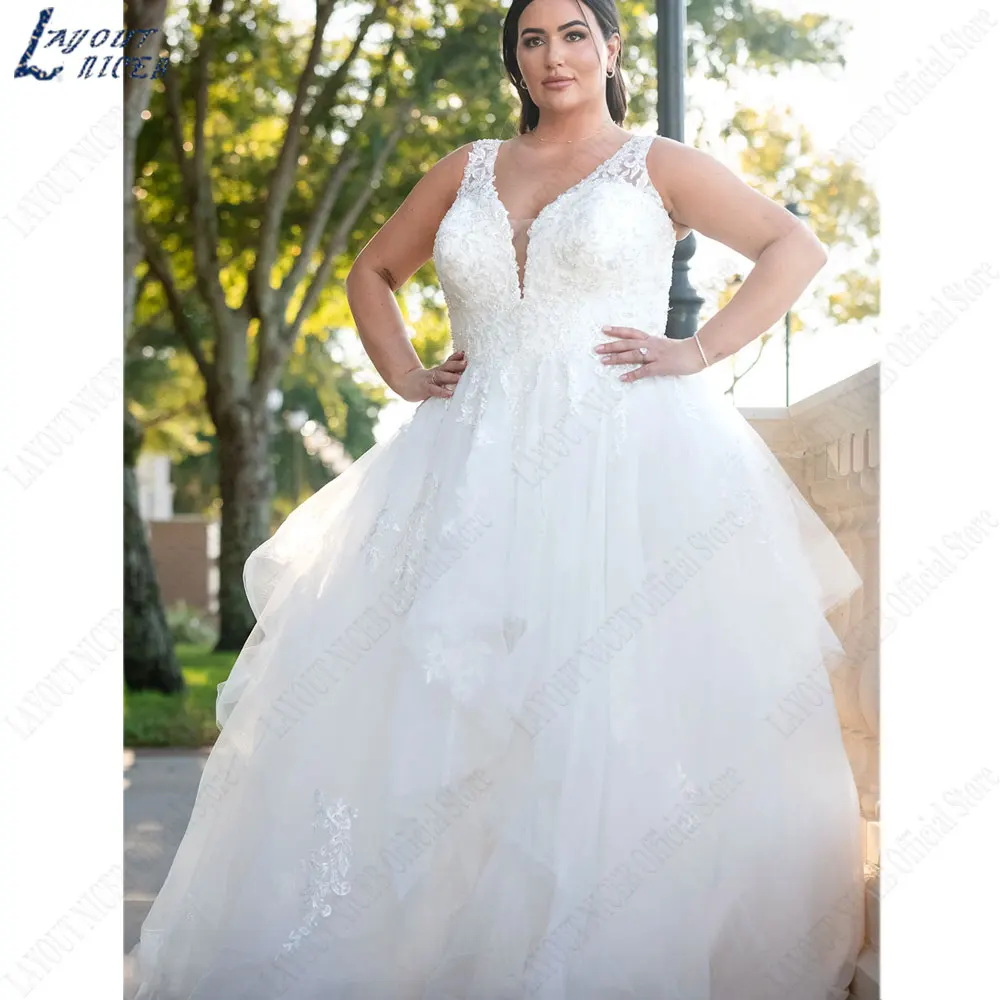 LAYOUT NICEB spachetti cinghie scollo a v profondo abiti da sposa Appliques di pizzo abiti da sposa indietro Lace Up abiti su misura de noviaLAYOUT NICEB spachetti cinghie scollo a v profondo abiti da sposa Appliques d