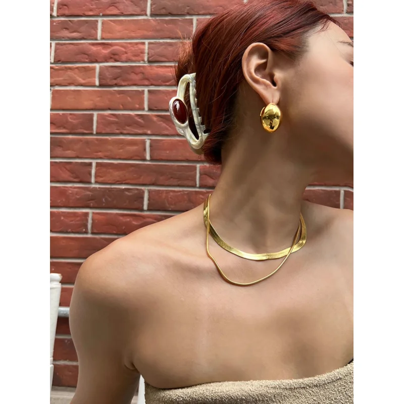 Women's stainless steel smooth large oval stud earrings, 2026 model exaggerated hollow spherical geometric ear ring, a wonderful