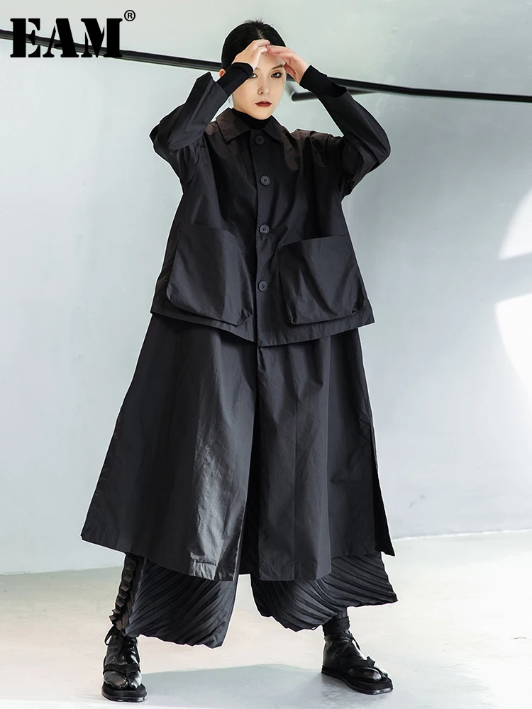 [EAM] Women Black Big Size Long Pocket Trench New Lapel Long Sleeve Loose Fit Windbreaker Fashion Spring Autumn 2025 1DE3081