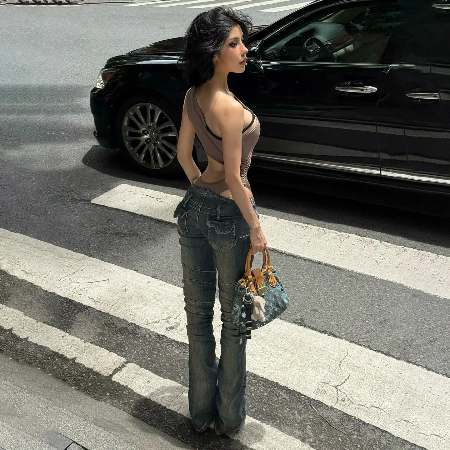 Vaqueros largos divididos de estilo retro de calle americana con un diseño sexy de pierna recta informal ajustado de tiro bajo
