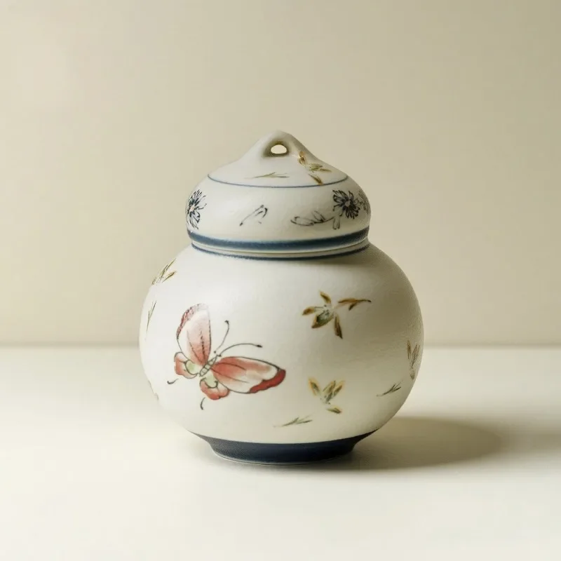 Blue and white flint red gold-painted butterfly orchid ceramic tea jar household storage jar fragrant powder jar tea warehouse