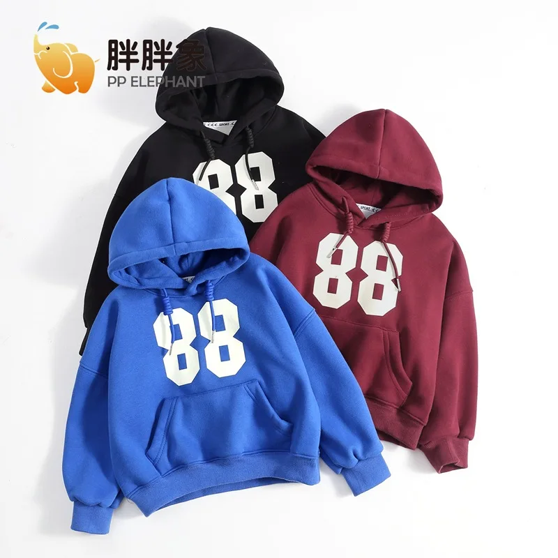 

‌Kids Hooded Sweatshirt: All-Season Warmth, Unisex Design, Machine Washable Streetwear