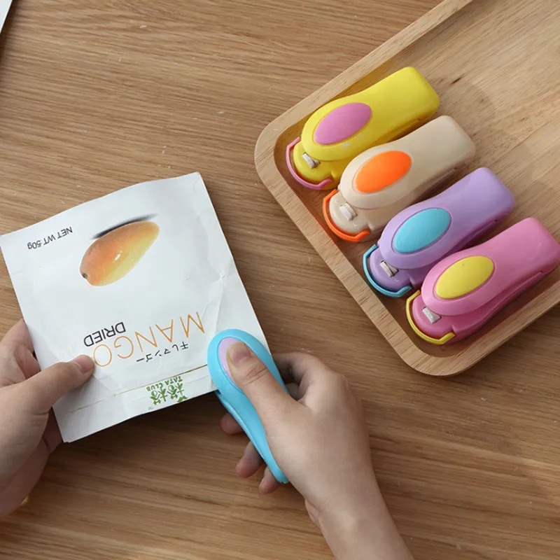 Sellador térmico de bolsas portátil, Mini máquina de sellado con Clip de almacenamiento de paquetes de plástico, práctico sello adhesivo para aperitivos de alimentos, Gadgets de cocina
