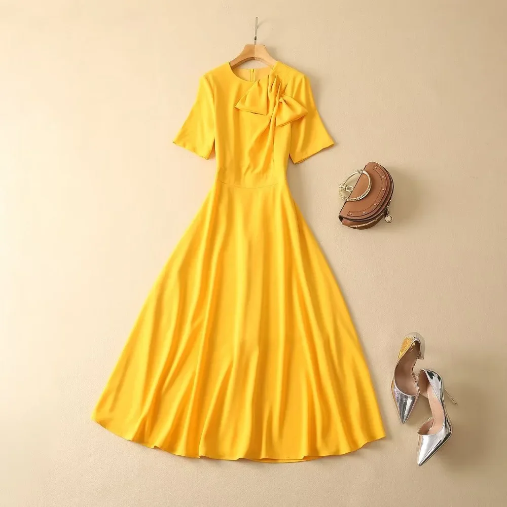 كيت ميدلتون رائجة البيع لموسم ربيع جديد المرأة جولة الرقبة قصيرة الأكمام فستان أصفر فراشة عقدة الخصر Cinching الركبة