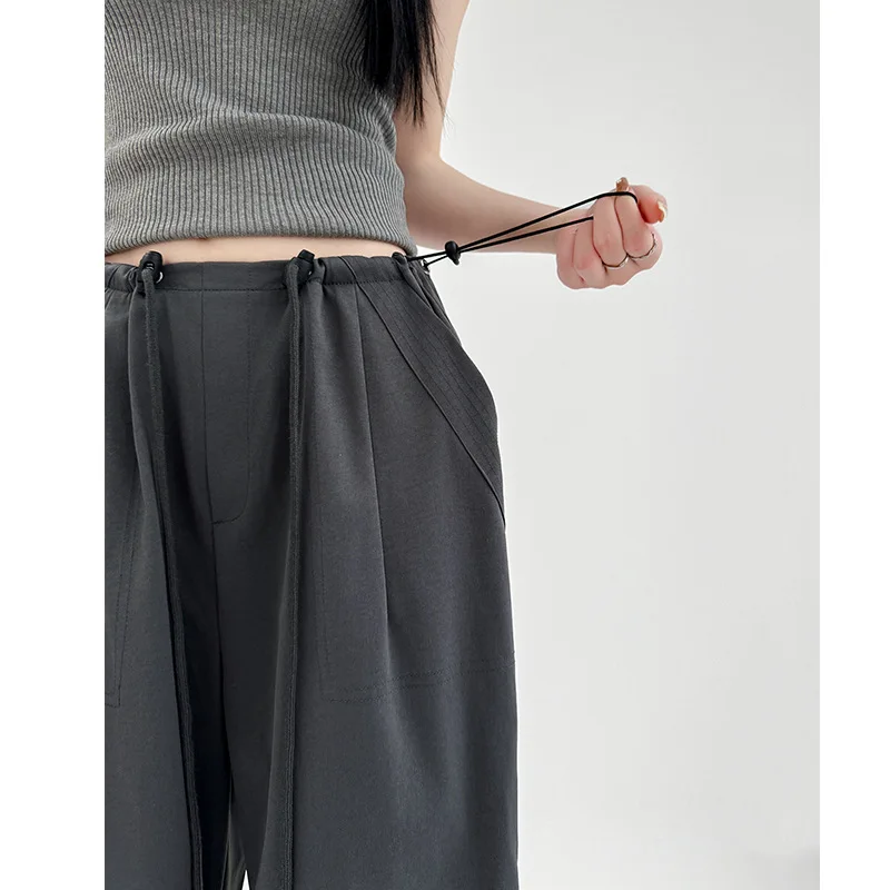 กางเกงคาร์โก้สไตล์อเมริกันสำหรับผู้หญิง ความรู้สึกระดับไฮเอนด์ ฤดูใบไม้ผลิและฤดูใบไม้ร่วง กางเกงวอร์มขากว้างทรงหลวมใหม่ กางเกงทหารร่มชูชีพเอวสูง S