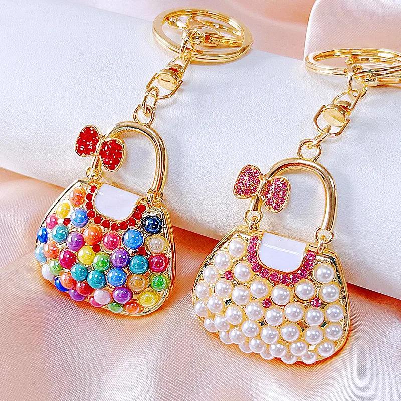 Diamond bow small satchel key chain Female creative bag metal pendant keychain.