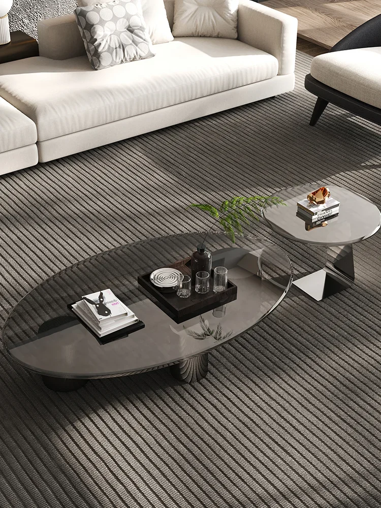 

Italian Minimalist Oval Gray Tempered Glass Coffee Table Stainless Steel Design Sense