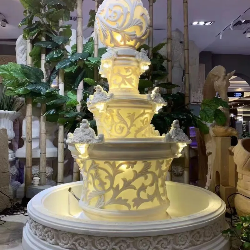

White resin stone fountain with indoor or outdoor carved details