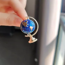 Trendy Enamel Globe Earth Ball Brooches for Women Creative Casual Metal Astronaut Brooch Pins Elegant Female Jewelry Gifts