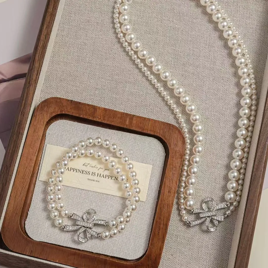 

Vintage Double-Layer Pearl Necklace with Zircon Bow Luxury High-Luster Sweater Chain Autumn Winter Fashion Jewelry for Women