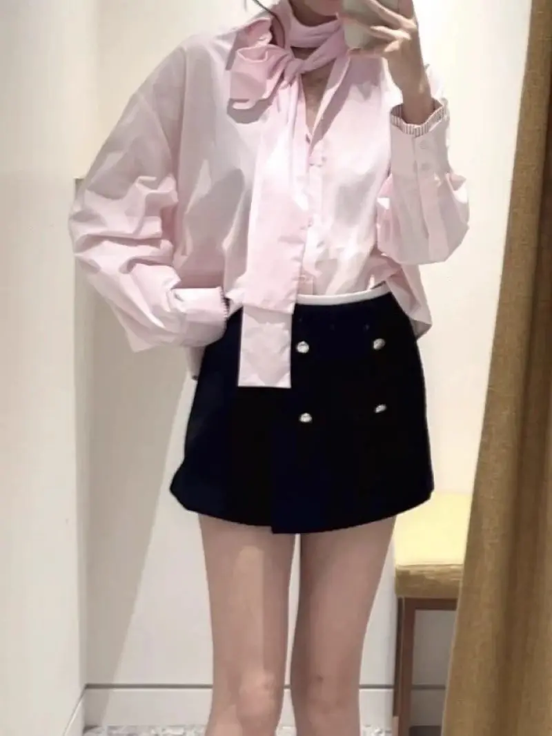 

Женская блузка на раннюю весну: розовая, с бантом на воротнике, однобортная, с длинным рукавом, свободного кроя