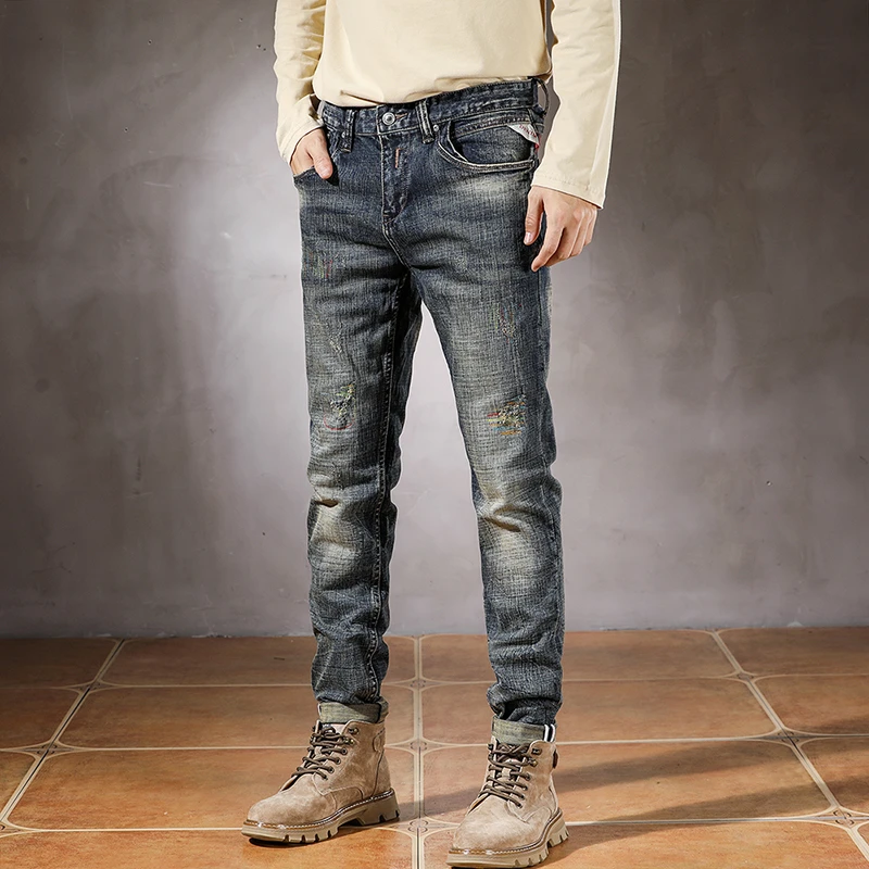 

American retro distressed and scraped denim men's trend slim fit small foot versatile cargo pants men skinny jeans men