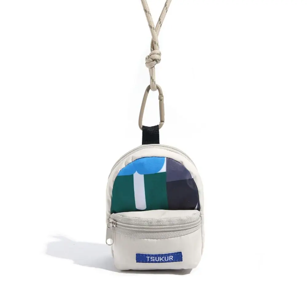 

Новый подвесной кошелек для монет контрастного цвета, сумка для хранения наушников, мини-кошелек, полиэстер, противоугонная маленькая сумка для ключей