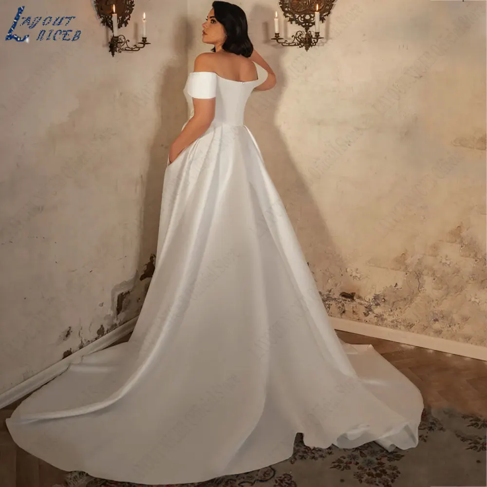 LAYOUT NICEB Boat Neck A-Line Satin Bride Gowns 2024 Off Shoulder Short Sleeves Wedding Dresses Backless Zipper robes de mariée