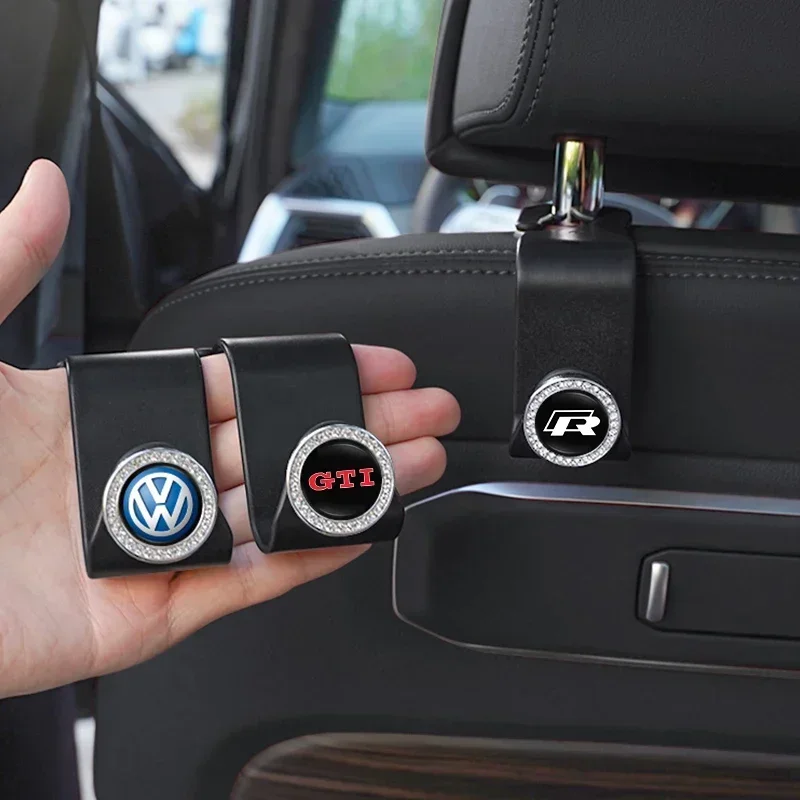 

2Pcs VW Emblem Car Seat Diamond Hooks Storage Hanger For Volkswagen GTI Polo Golf Arteon Tiguan Touareg CC Amarok Transporter
