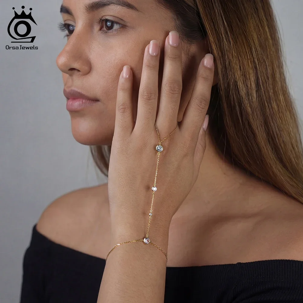 ORSA JEWELS Personality 925 Sterling Silver Ring Bracelet Hand Chain for Women Bowknot Ring Connect Bracelets Jewelry APV02