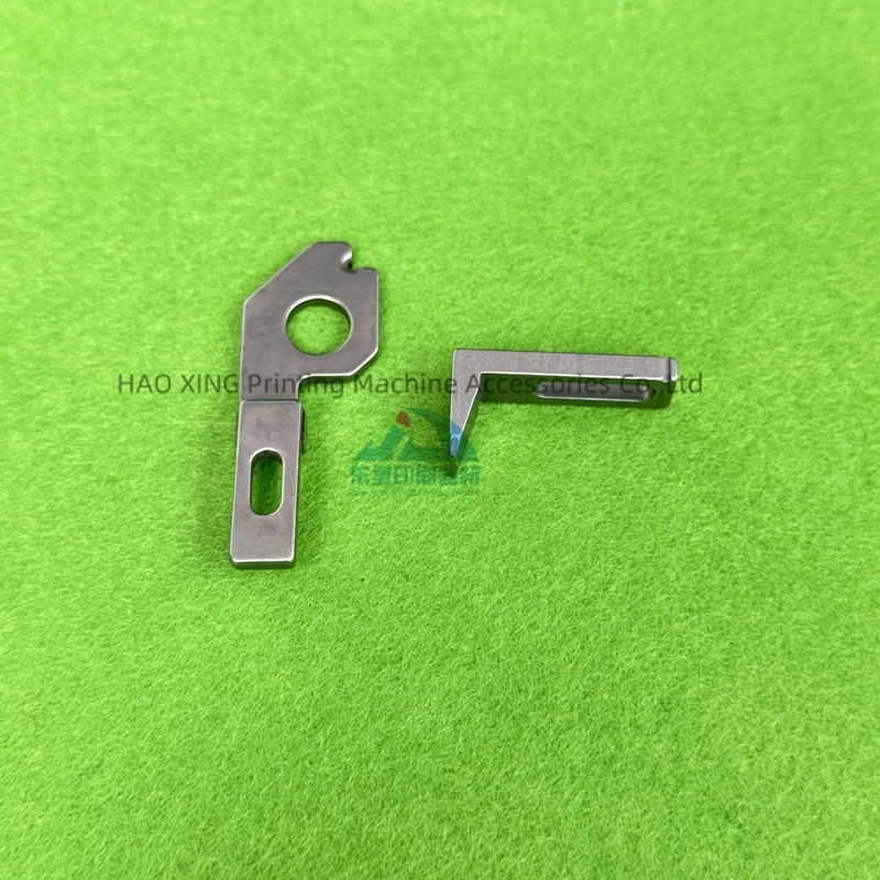 Tête de clou de pièces de rechange pour machines d'impression 24910749   Tête de clou pour accessoires d'impression Offset Muller Martini 75 24910749   Vente chaude