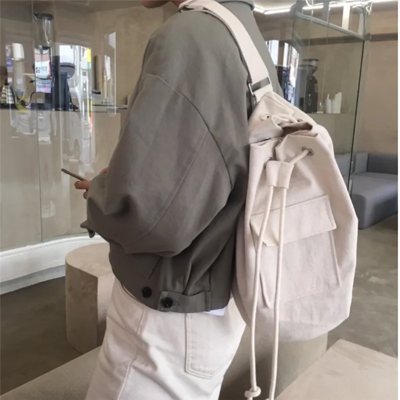 

TRSYPHXM 2024 Autumn/Winter New Korean New Flip Pocket Drawstring Canvas Bag Single Shoulder Diagonal Span Bucket Bag