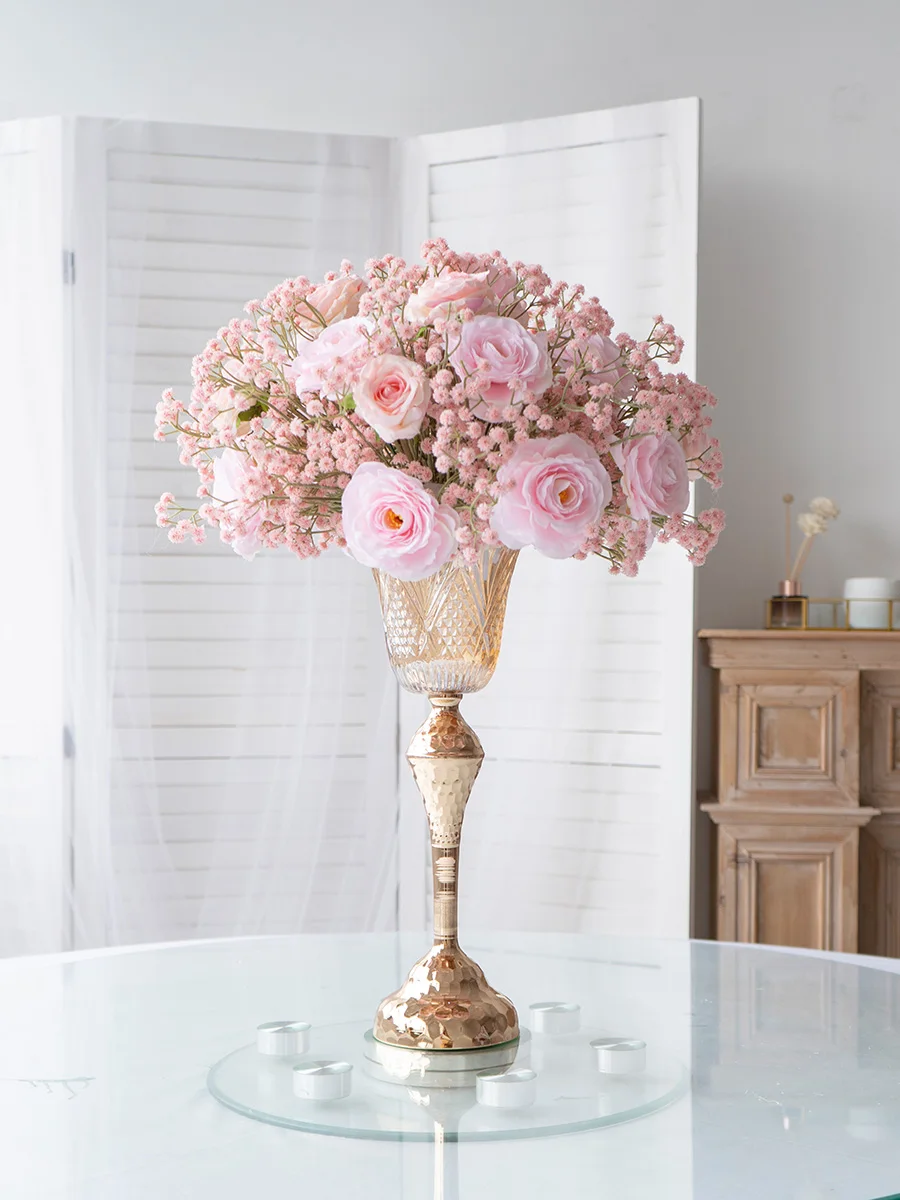 Hotel wedding banquet table with gypsy roses, simulated flowers, fake flowers, European decorative flowers