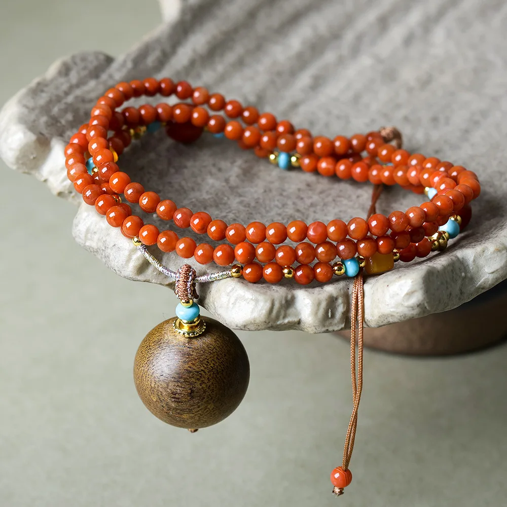 Diseño original: ágata roja del sur emparejada con el collar con colgante de Qinan amarillo que se hunde, cadena de suéter de estilo chino para juguetes culturales