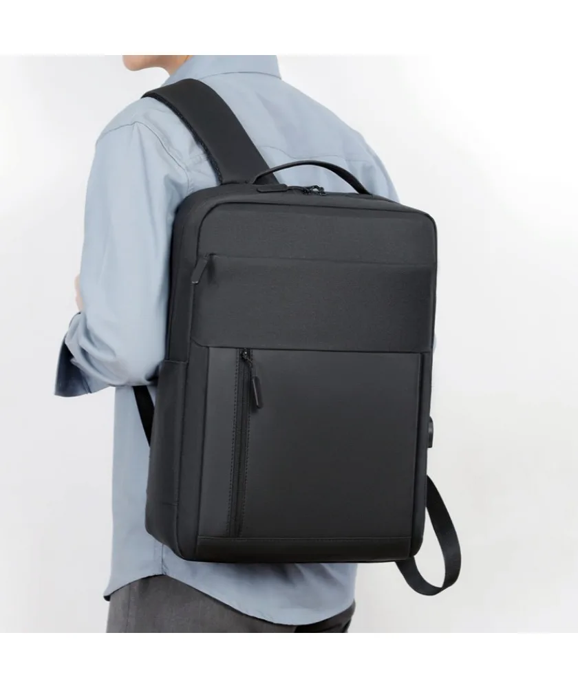 Black slim business laptop backpack with front pocket design water resistant fabric with USB charging port for office commute