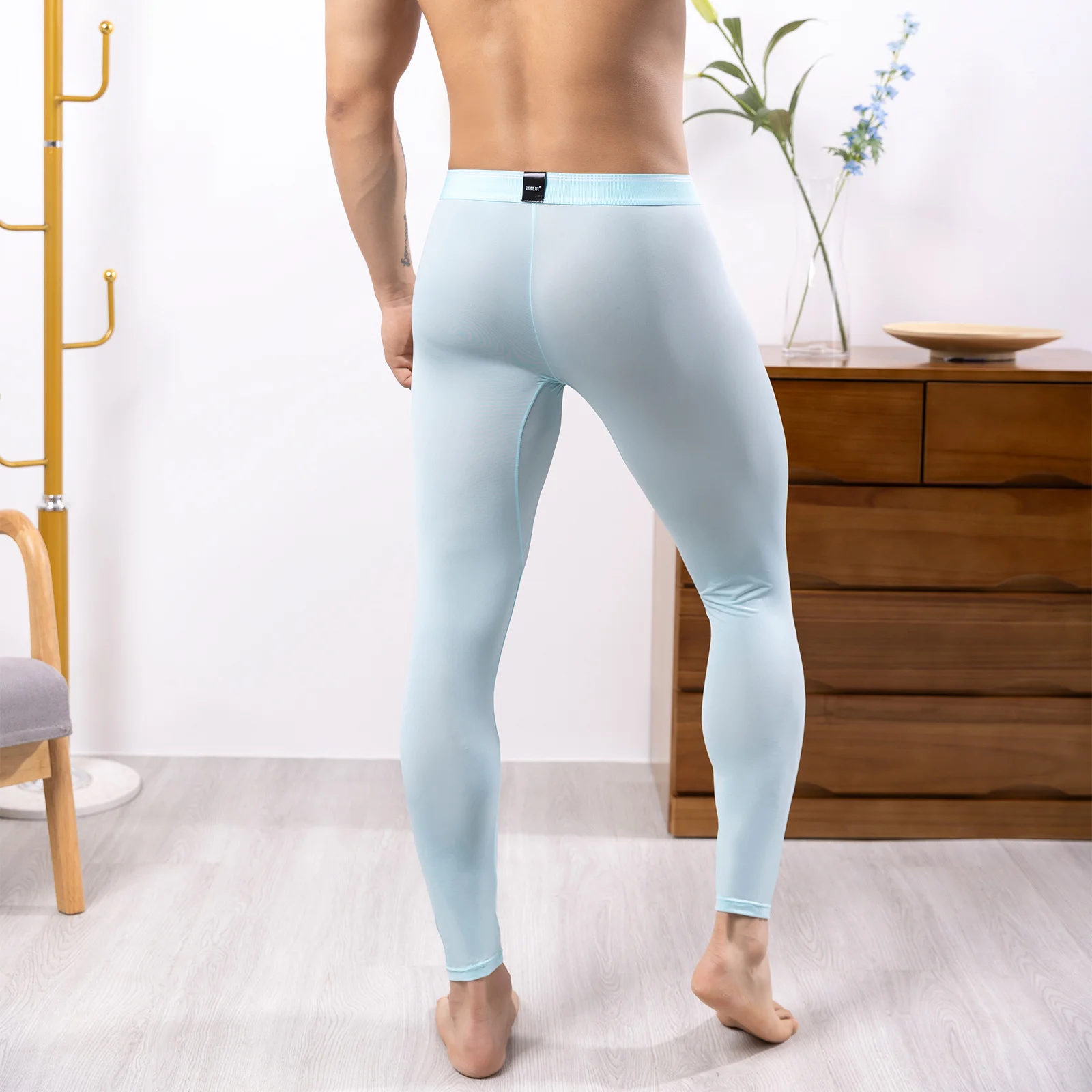 Mallas deportivas que absorben la humedad para hombre, cintura elástica, bolsa para bulto, pantalones ajustados elásticos para gimnasio, Fitness, Yoga, ciclismo, ropa de dormir