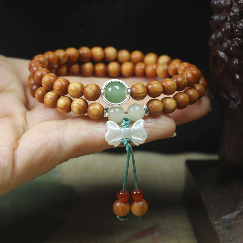 

Banyan wood high-oil content 6mm bracelet with bow pendant, forest-style women's Buddhist prayer beads jewelry