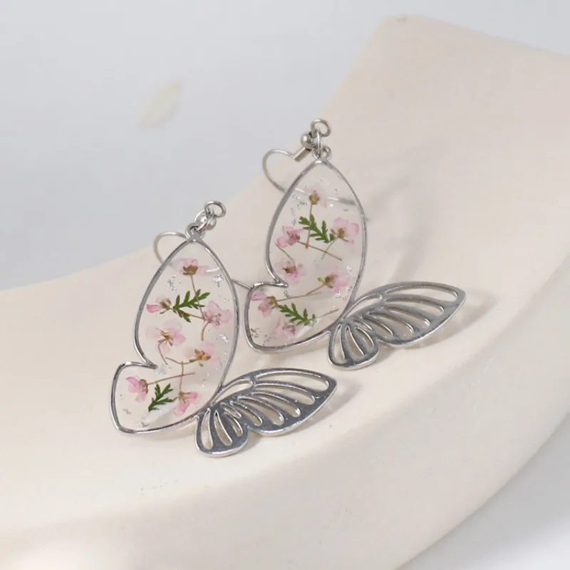 

Eleagnt Butterfly Earrings Unique Epoxy Resin Natural Dried Flowers Earrings Handmake Pressed Flower Statement Jewelry Wholesale