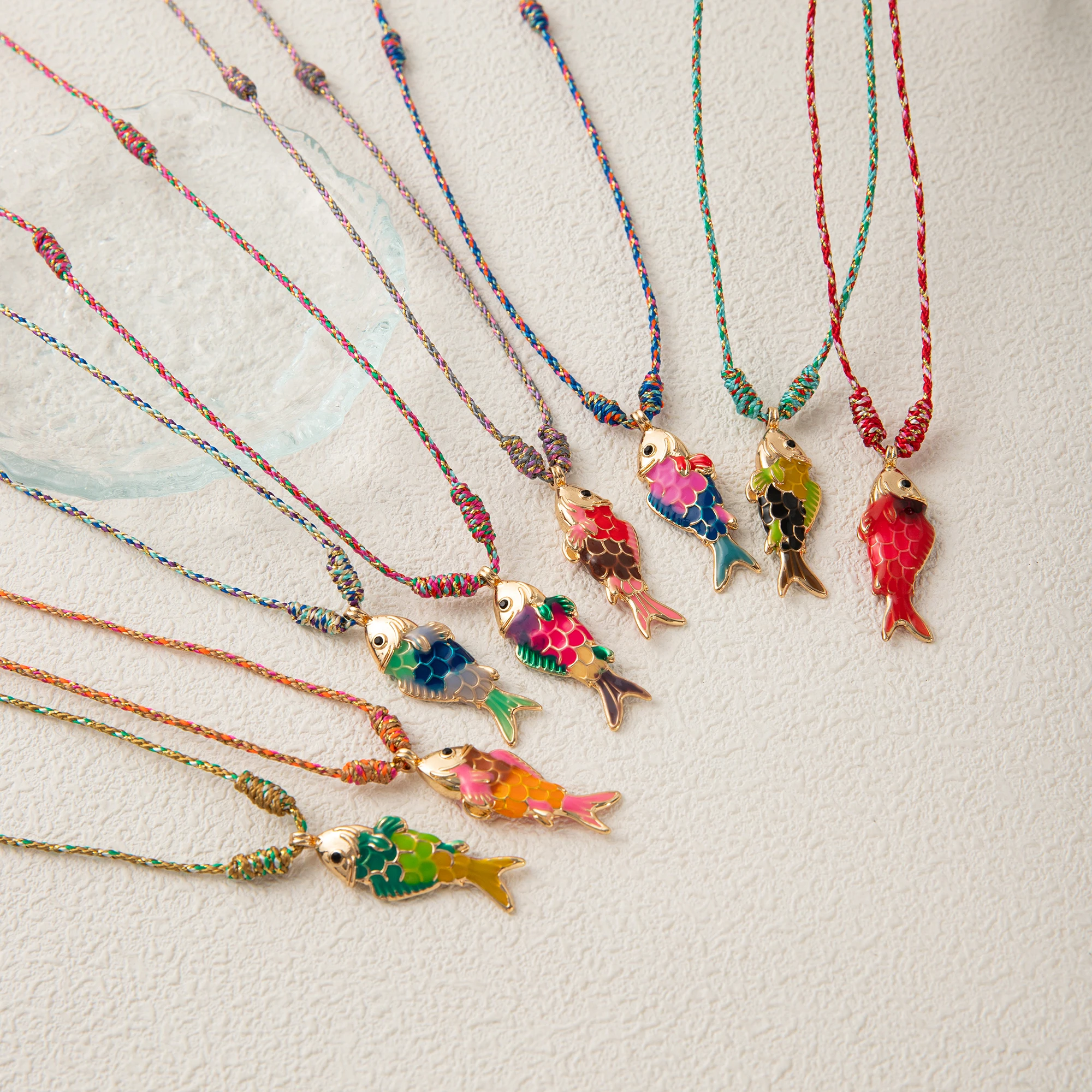 

Hot selling and popular colorful rope necklace, ocean fish pendant, fashionable single item, gold-plated color preservation