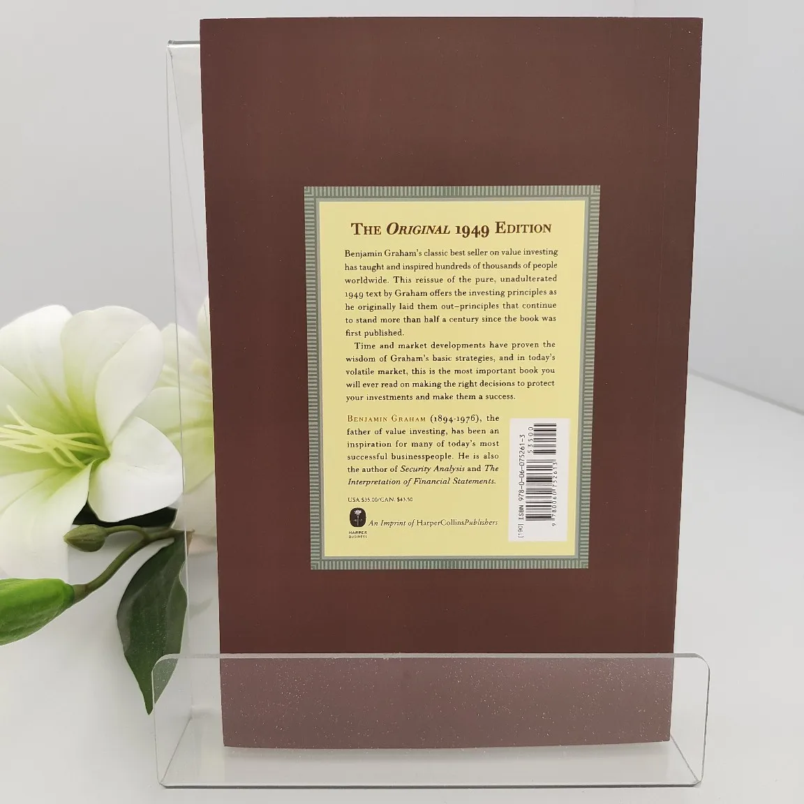 The Intelligent Investor by Benjamin Graham: The Essential Guide to Defensive Investing & Long-Term Value