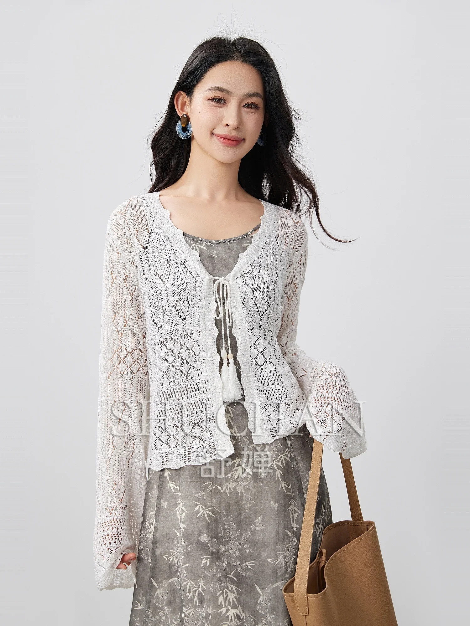 

2025 Summer Heavy Industry Hollow-out Hollow Out Knitted Cardigan + Chinese Ink Printing Suspender Dress Set