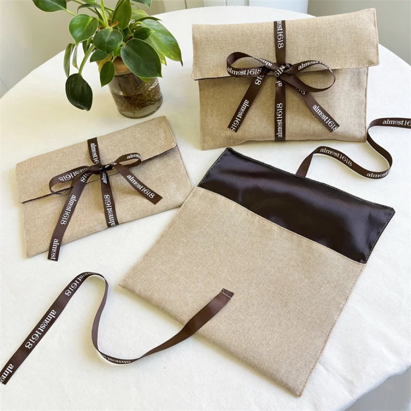 custom.Ribbon Custom Luxury Jute Envelope Dust Bag Clothing Hair Packing Bags Linen Jute Envelope Flap Pouch with Satin Lin