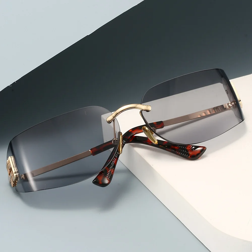 2026 New High End Sunglasses Women Frameless Curved Integrated Sun Glasses for Eye Protection and Sunscreen Travelling Hiking