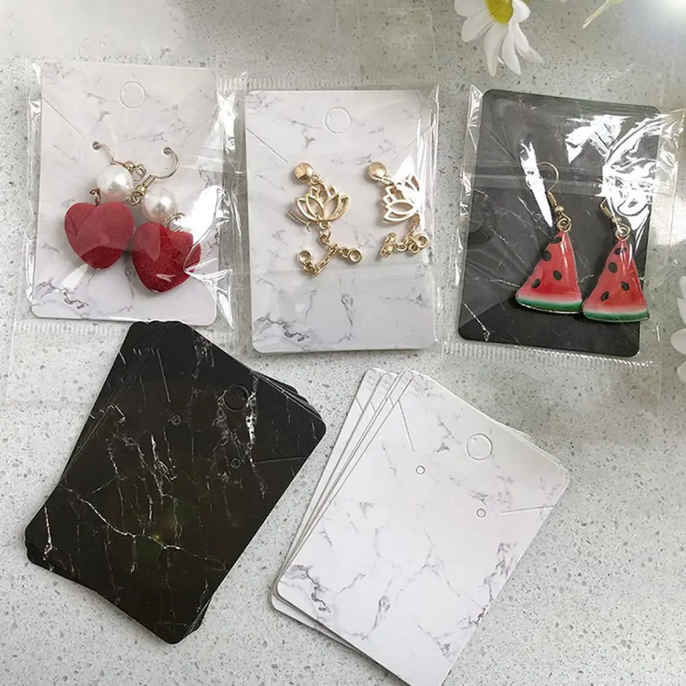 

Набор из 10 карточек для демонстрации ювелирных изделий: для серег и ожерелий, бумажные подвесные карточки с мраморным узором, плоская поверхность, прозрачная резиновая основа