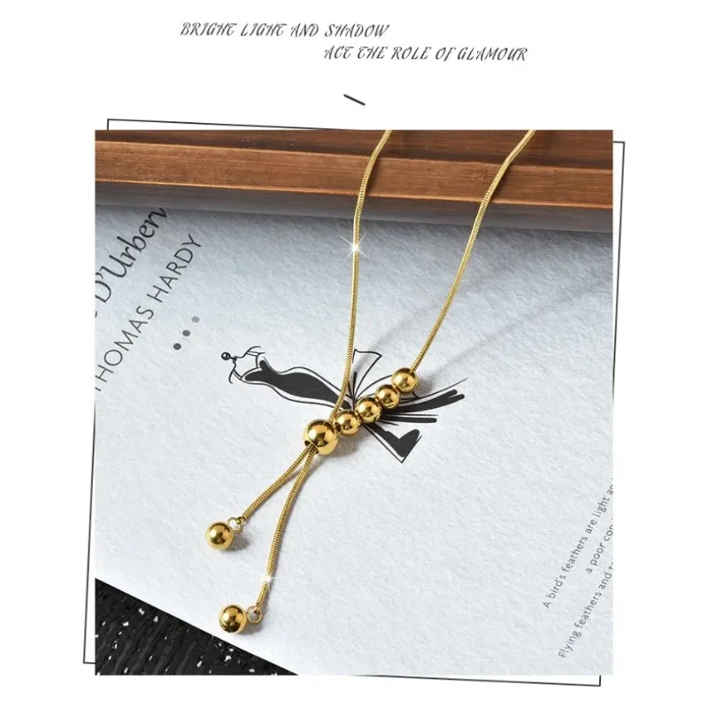 

A brand-new personalized pull-out steel ball tassel necklace, a titanium steel necklace suitable for women