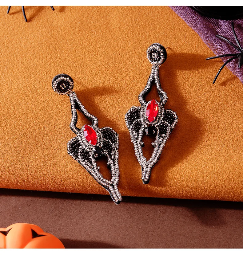 

Beaded earrings All Saints' Day Spider Design Originality Play tricks Hand knitting Bohemia Alloy Tide Simple Rice bead earrings