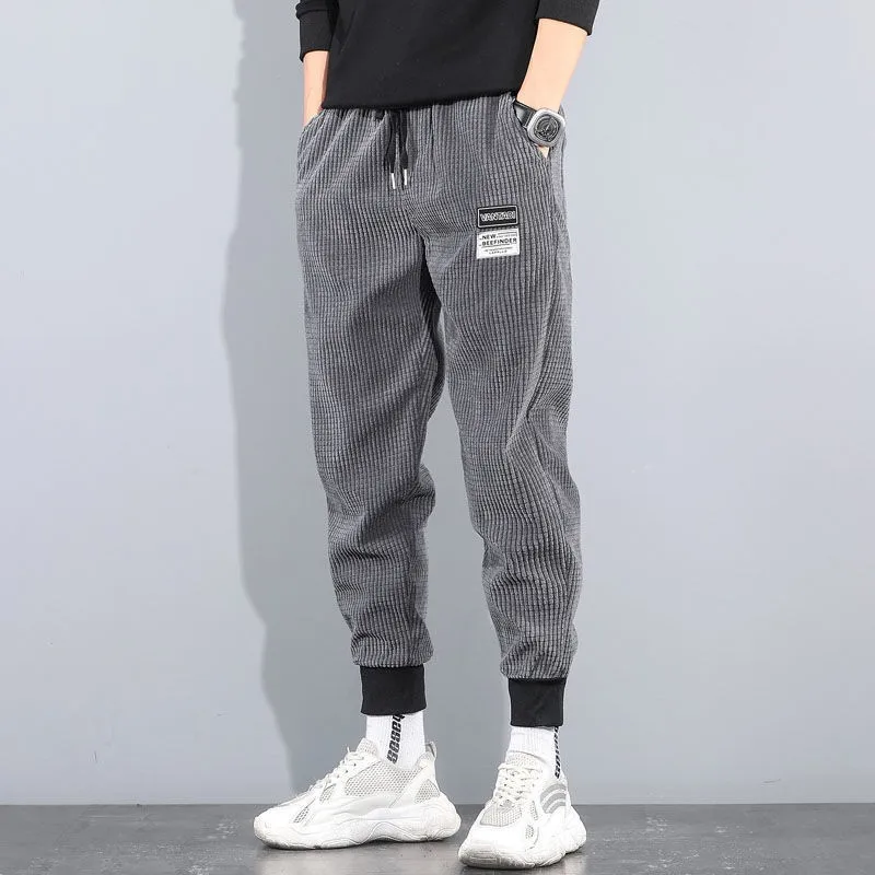 

Autumn Winter Men's Corduroy Pants Slim Fit Casual Long Trousers Spring Thin Sports Pants Low Waist Elastic Youth Sle