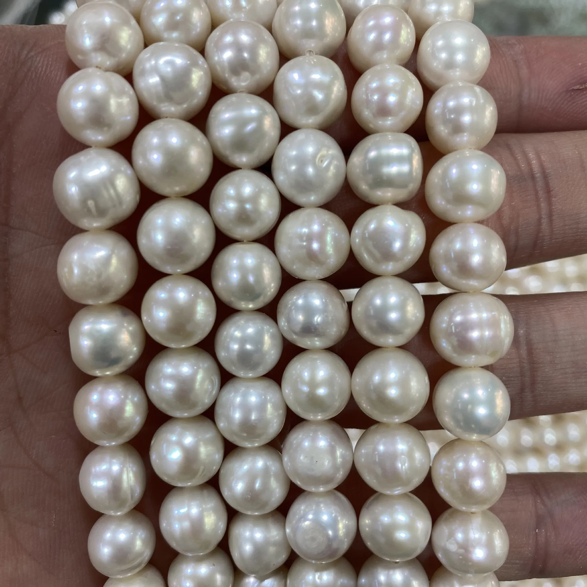 

9-10mm cultured natural white color near round shape freshwater potato pearls strand