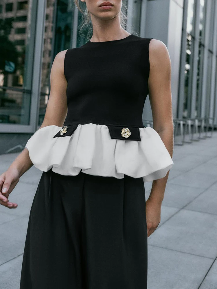 

European and American style autumn new fashion trend women's round neck sleeveless elastic metal button decorated top