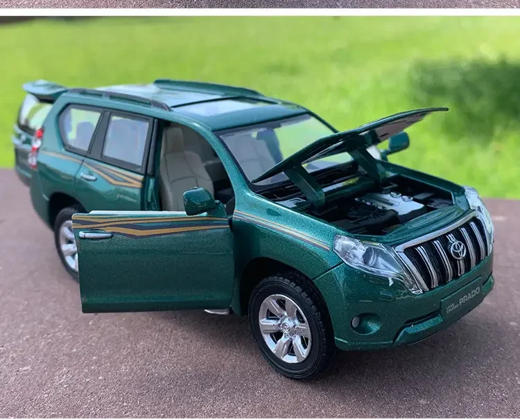 1:32 TOYOTA LAND CRUISER PRADO Lega di metallo Suono e luce Modello di auto Giocattoli con tirare indietro per i regali di compleanno dei bambini A177