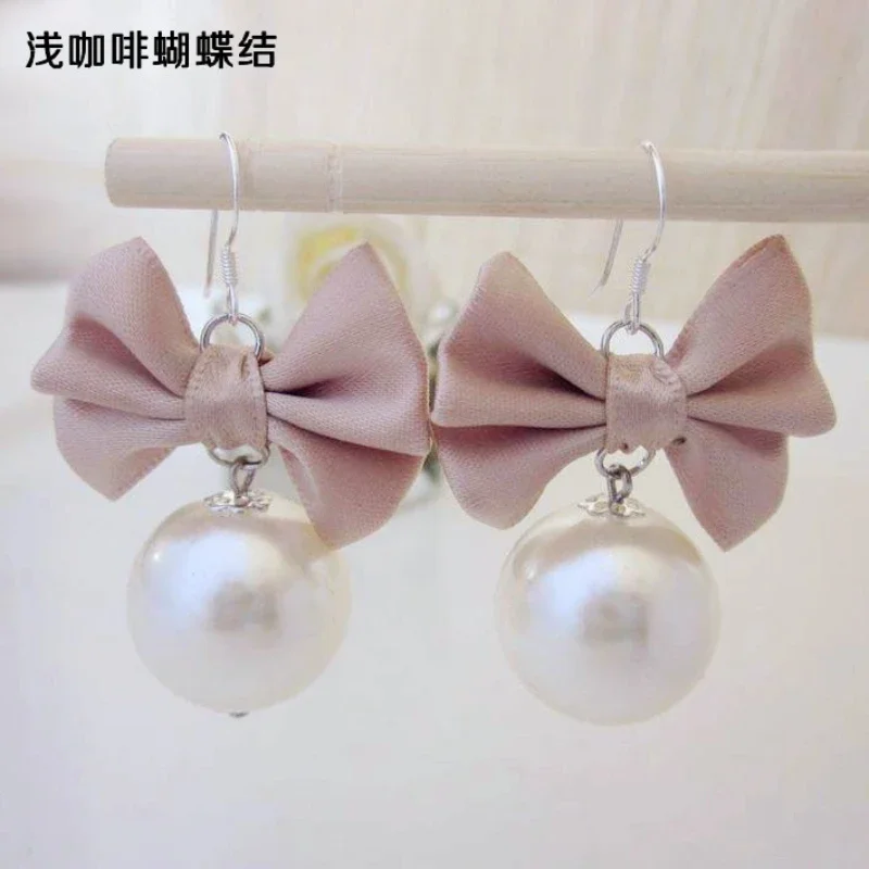

Серьги с бантом и жемчугом модные корейские серьги