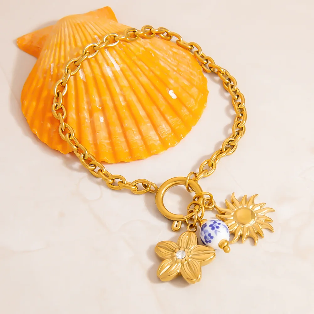 

Fashion Chinese Style Blue and White Porcelain Flower Pendant Gold Color Stainless Steel Bracelet for Woman Gift Non Fading